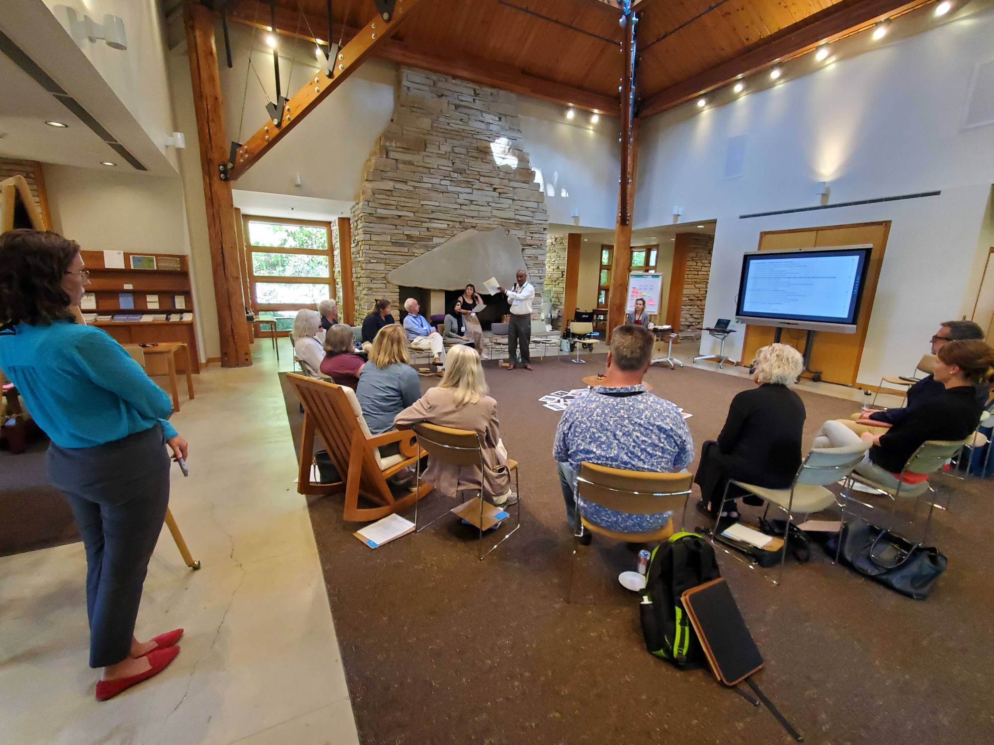 Convening attendees seated in a circle